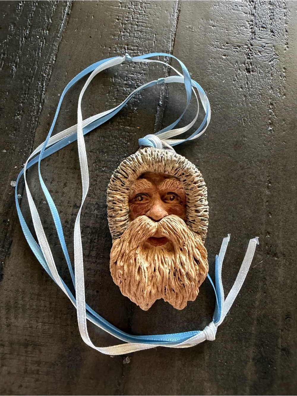 Handpainted Chalk Cream and Brown Bearded Face Necklace with Light Blue Ribbon
